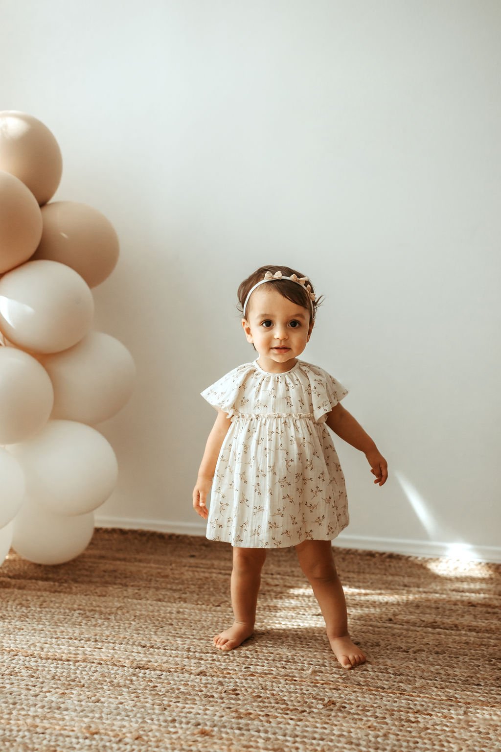 baby, cake, smash, girl, kate, baby, in, studio, in studio, milestone, photo, session, milestone photos, neutral colors, beige photo, authentic photos, candid photos, cake, cake baby, cake smash blog, cake smash ideas, cake smash photography tips,