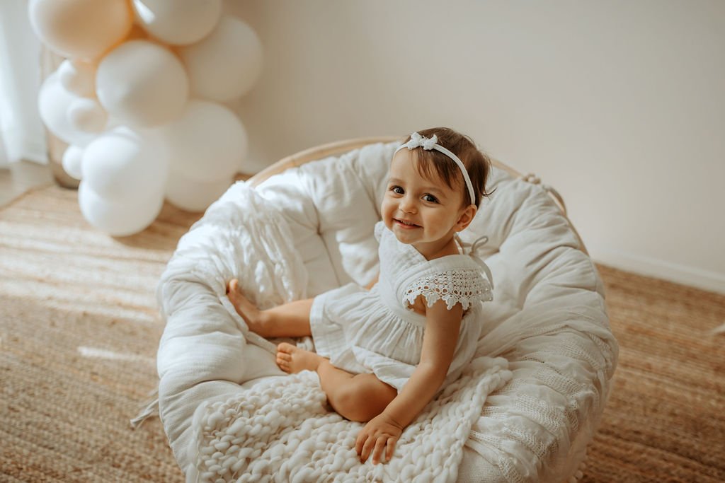 baby, cake, smash, girl, kate, baby, in, studio, in studio, milestone, photo, session, milestone photos, neutral colors, beige photo, authentic photos, candid photos, cake, cake baby, cake smash blog, cake smash ideas, cake smash photography tips,